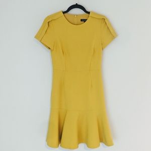 Classy structured dress with flowy hem